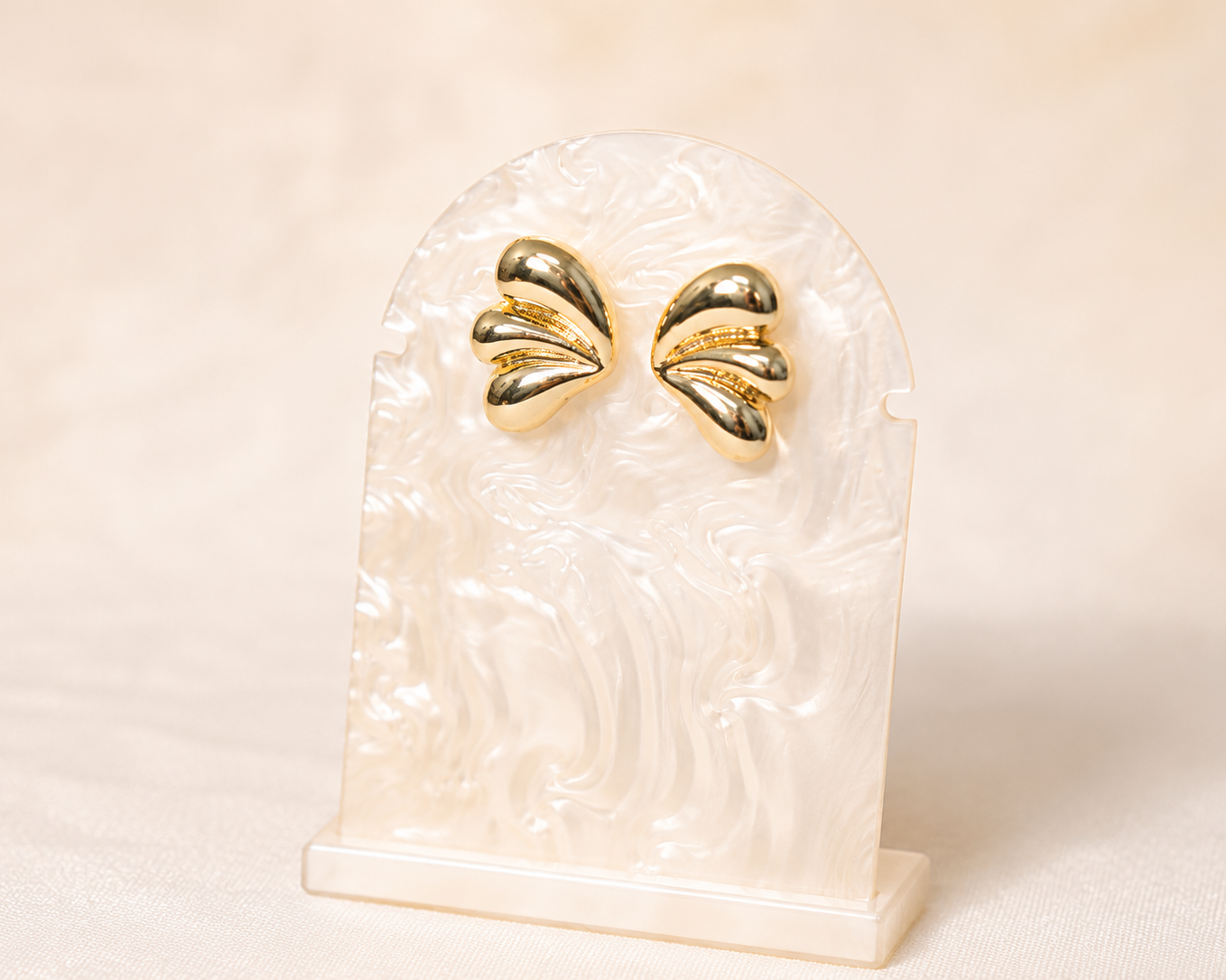Ohrring mit Muschelform